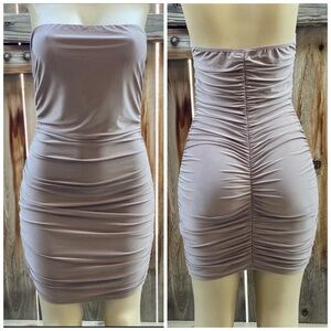 Smocked dress in tan with pullover available in small, medium and large